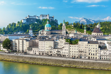 Fototapeta na wymiar Beautiful view on Salzburg skyline with Festung Hohensalzburg heritage in the autumn and Austrian Alps, Salzburg, Austria