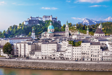 Fototapeta na wymiar Beautiful view on Salzburg skyline with Festung Hohensalzburg heritage in the autumn and Austrian Alps, Salzburg, Austria