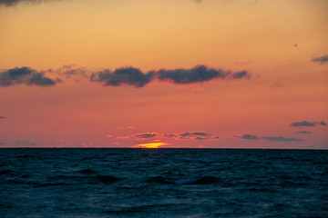 colorful sunset on the sea beach in summer