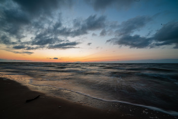 Fototapeta na wymiar colorful sunset on the sea beach in summer