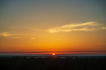 Fototapeta premium colorful sunrise sunset in misty summer meadow