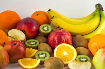 Tropical fruits on a white background, juicy still-life from fruit. Useful fruit for a healthy diet. Mix of different fruits.