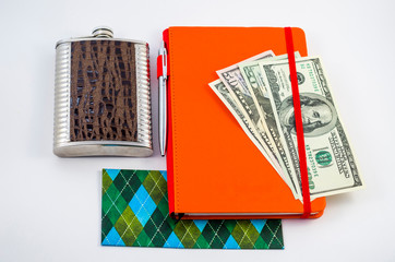 Notepad with pen, money and flask with whiskey. Men's accessories. Set of business men on a white background.