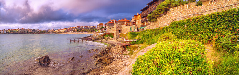 Coastal landscape, panorama, banner - embankment with fortress wall in the city of Sozopol on the Black Sea coast in Bulgaria