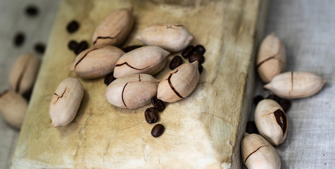 pecan nuts and coffee grains closeup