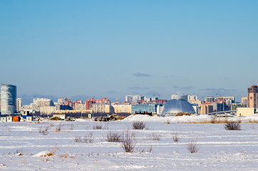 Fototapeta premium City panorama of winter St. Petersburg, a new modern district of the city, Russia, St. Petersburg, March 9, 2018
