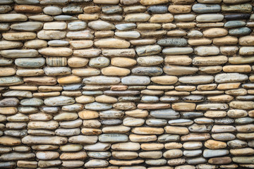 Beautiful River Pebble Wall Background. Seamless pebble stone floor and wall pattern arranged for texture wallpaper.