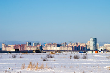 Obraz premium City panorama of winter St. Petersburg, a new modern district of the city, Russia, St. Petersburg, March 9, 2018