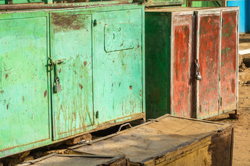 Market crates secured with padlocks at a market in a village in Sudan