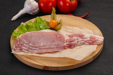 Raw pork bacon