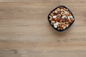 Obraz na płótnie Canvas mixed nuts in a bowl