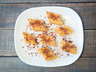 Delicious cakes on a white plate