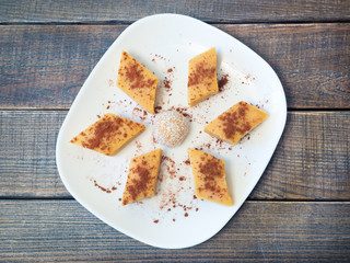 Delicious cakes on a white plate