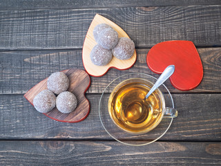 Delicious cakes on a white plate and a Cup of tea