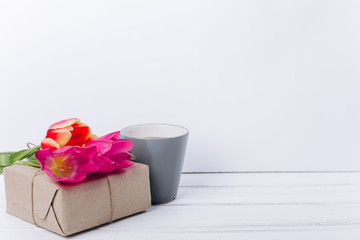 Mother's day composition.Vase with flowers and breakfast.