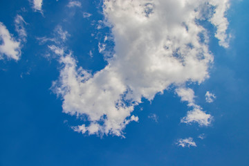 Fototapeta na wymiar Blue sky and white clouds as a background template.