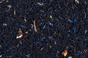 Close up of a blend of gourmet tea leaves background texture
