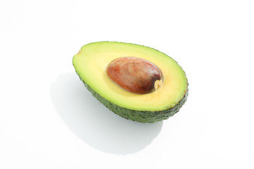 Half of avocado on white background, space for text