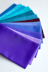 Colorful palette of textile swatches for color determination. Image-maker stuff.