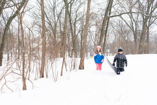 Children walk in snow