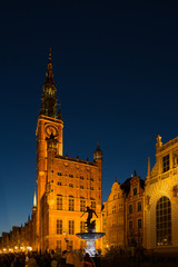 Obraz premium The dark view of Gdansk, old town and famous crane at amaizing night with light reflections. Poland
