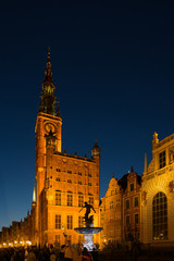 Fototapeta na wymiar The dark view of Gdansk, old town and famous crane at amaizing night with light reflections. Poland