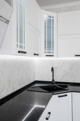Modern gourmet kitchen interior. Beautiful white design