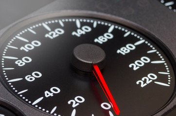 Close up shot of a speedometer in a car