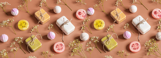 Flat composition with cosmetic products on a colored background. Place for text