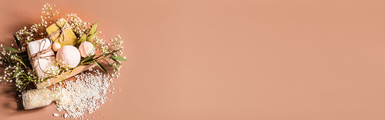 Spa or health plan frame with towels, soap, leaves, flowers, bath bombs