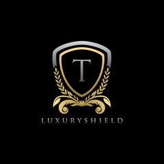 Golden Shield T Letter Logo
