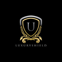 Golden Shield U Letter Logo