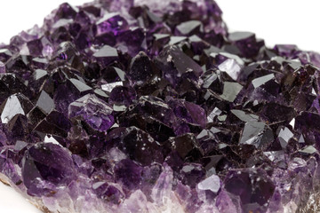 Amethyst Crystal Druse  macro mineral on white background close up