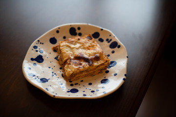 slice of lasagna served on a plate