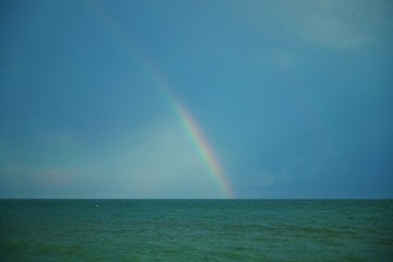 Rainbow over the sea.
