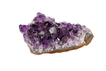 Fototapeta premium Amethyst Crystal Druse macro mineral on white background close up