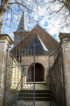 Munshausen church entrance, at Munshausen, Canton of Clervaux, Luxembourg