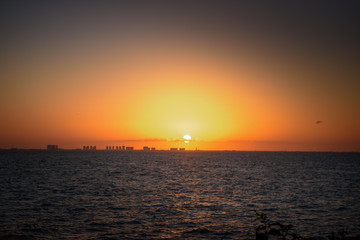 Fototapeta premium Sunset on the Caribbean Sea. Orange shades.