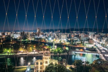 Hiroshima Cityscape -View from Orizuru Tower at night on the side of Motoyasu River in Japan with...