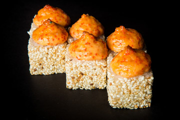 japanese baked roll with salmon, green onion and cheese sauce