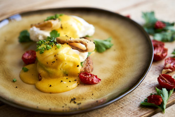 Healthy spring breakfast food with avocado toast, poached egg