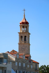 Historical bell tower in small town Sutivan, island Brac, Croatia.