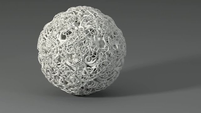 Complex, tangled, fractal ball rotating.