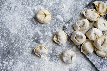fresh tortellini in a bowl with basil and parmesan
