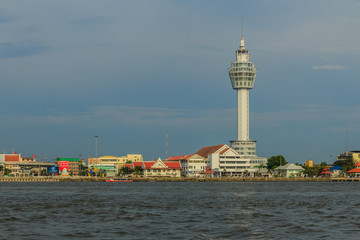 Samut Prakan, Thailand - March 25, 2017: Riverfront view of Samut Prakan city hall with new observation tower and boat pier. Samut Prakan is at the mouth of the Chao Phraya River on Gulf of Thailand.