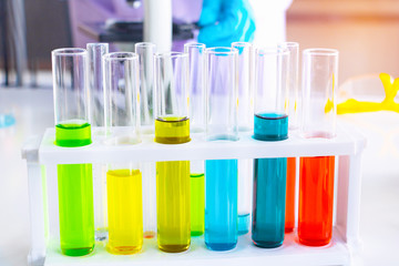 Scientific test tube. Colorful test tube in lab science background.