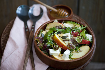 Light Fresh Home made fruit apple salad with walnuts, vegetables, feta cheese.