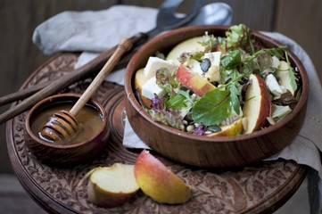 Light Fresh Home made fruit apple salad with walnuts, vegetables, feta cheese.