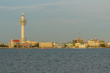 Samut Prakan, Thailand - March 25, 2017: Riverfront view of Samut Prakan city hall with new observation tower and boat pier. Samut Prakan is at the mouth of the Chao Phraya River on Gulf of Thailand.