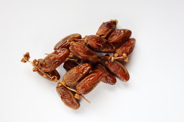 The Dates on the twig, white background